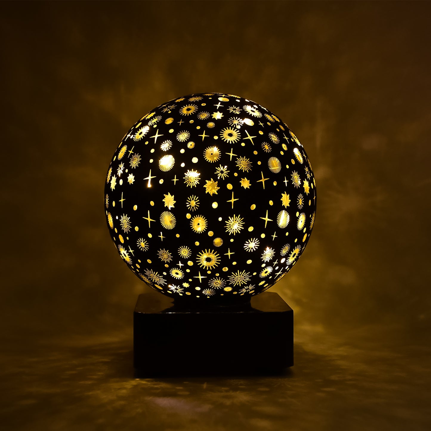 Wukusy Starry Sky Projector Night Lamp displaying a starry sky pattern on a wall in a cozy home setting