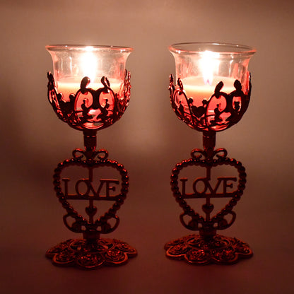 Wukusy tea lights holder candle stand set with two decorative metal candle holders for home decor and ambiance.