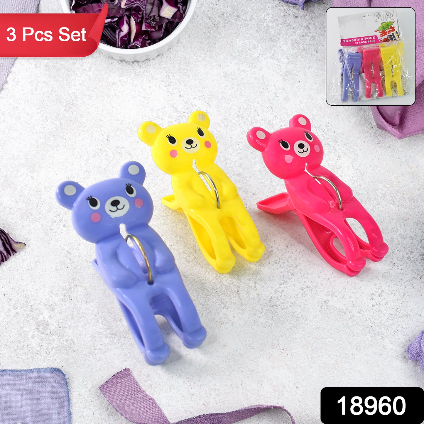 Set of three Wukusy windproof plastic towel clips for secure outdoor drying and home improvement use.