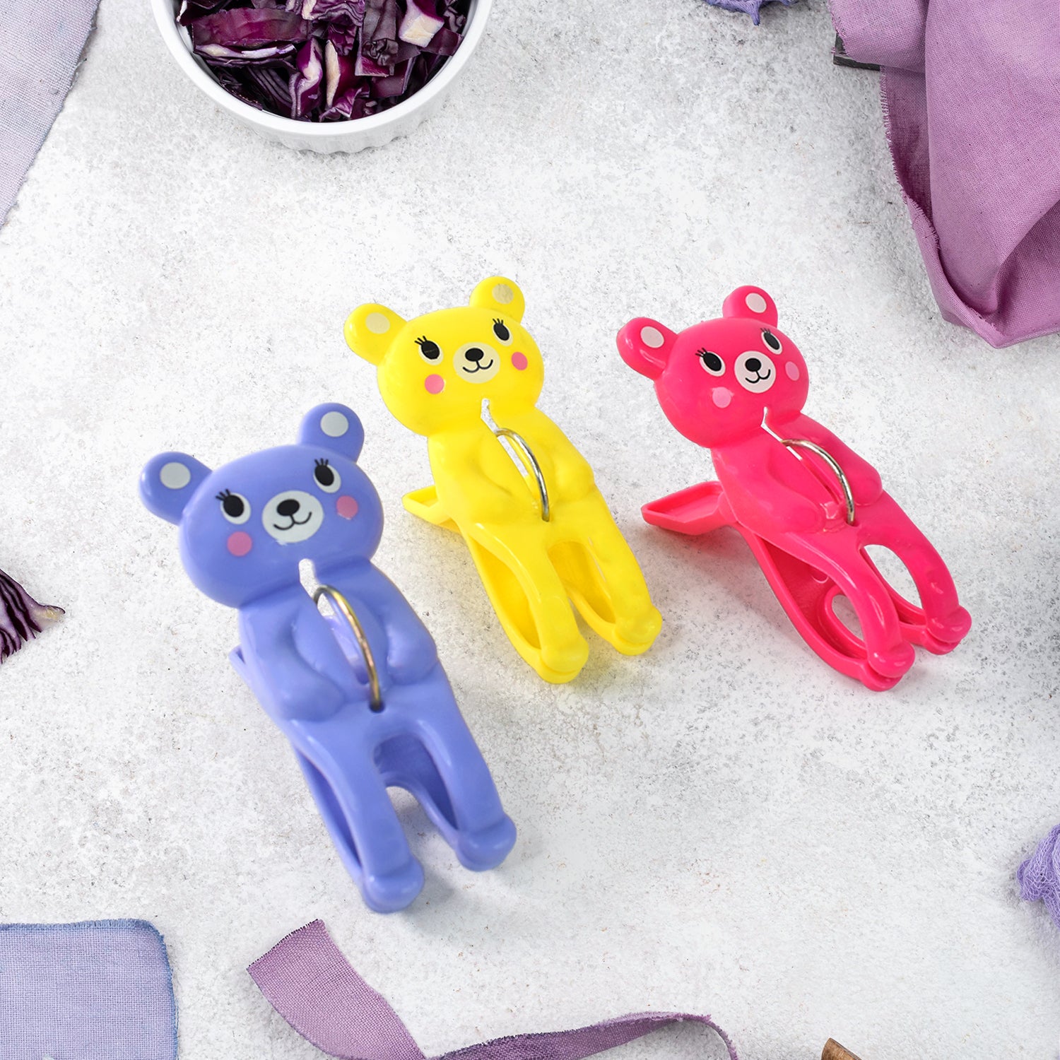 Set of three Wukusy windproof plastic towel clips for outdoor use, ideal for securing towels on clotheslines and avoiding wind disruption.