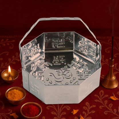 Traditional stainless steel octagon Pooja basket with handle, designed for home improvement and prayer rituals.