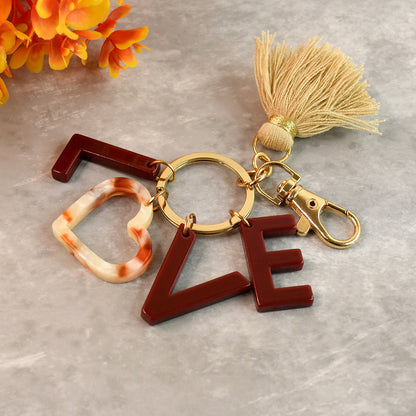 Wukusy trendy designer assorted keychains with mixed designs, perfect for home improvement and decorative use.