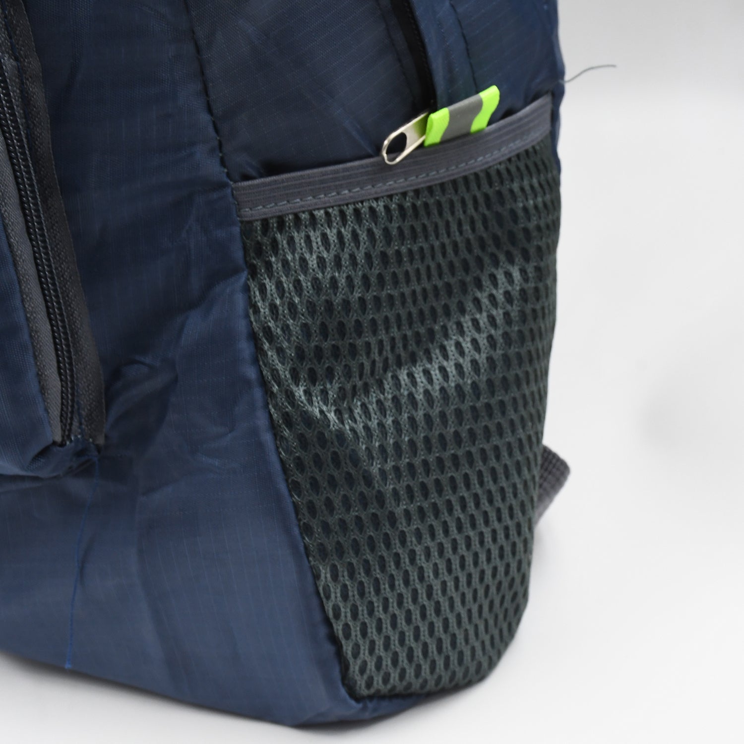 Wukusy ultralight folding backpack for outdoor travel and mountaineering, compact and portable for men and women.