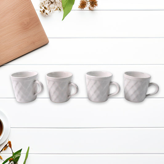 Set of six Unibic ceramic tea cups with a plastic leaf-shaped tray, perfect for serving tea in a stylish home improvement setting.