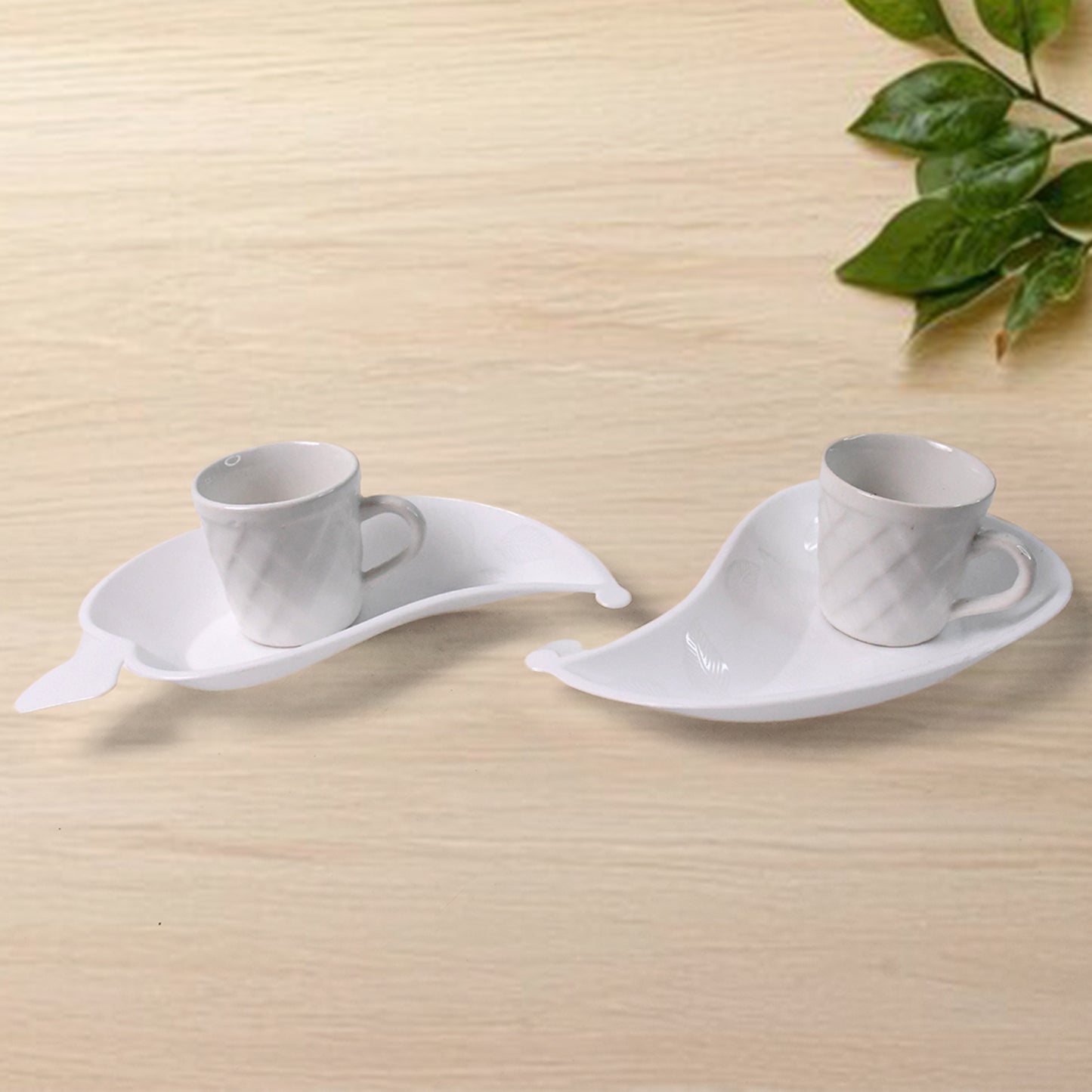 Set of six Unibic ceramic tea cups with a plastic leaf-shaped tray, perfect for home serving and elegant tea presentation.