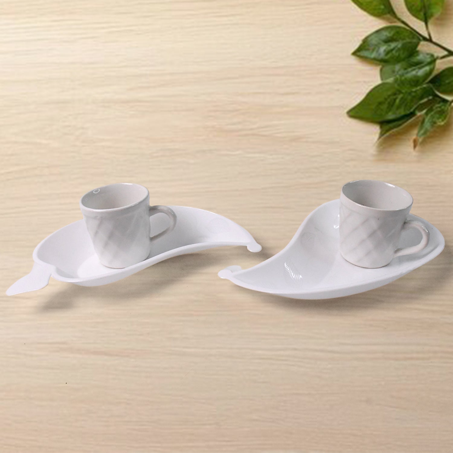 Set of six Unibic ceramic tea cups with a plastic leaf-shaped tray, perfect for home serving and elegant tea presentation.