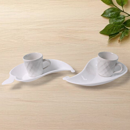 Set of six Unibic ceramic tea cups with a plastic leaf-shaped tray, perfect for home serving and elegant tea presentation.