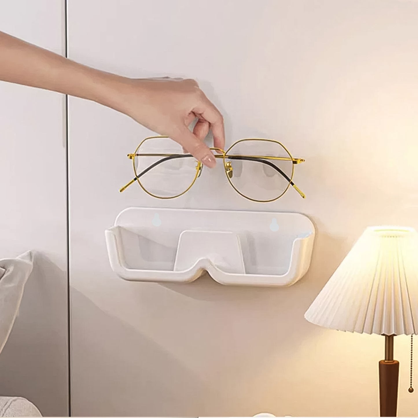 Wukusy wall mount adhesive sunglass holder for organizing sunglasses on a home improvement wall.