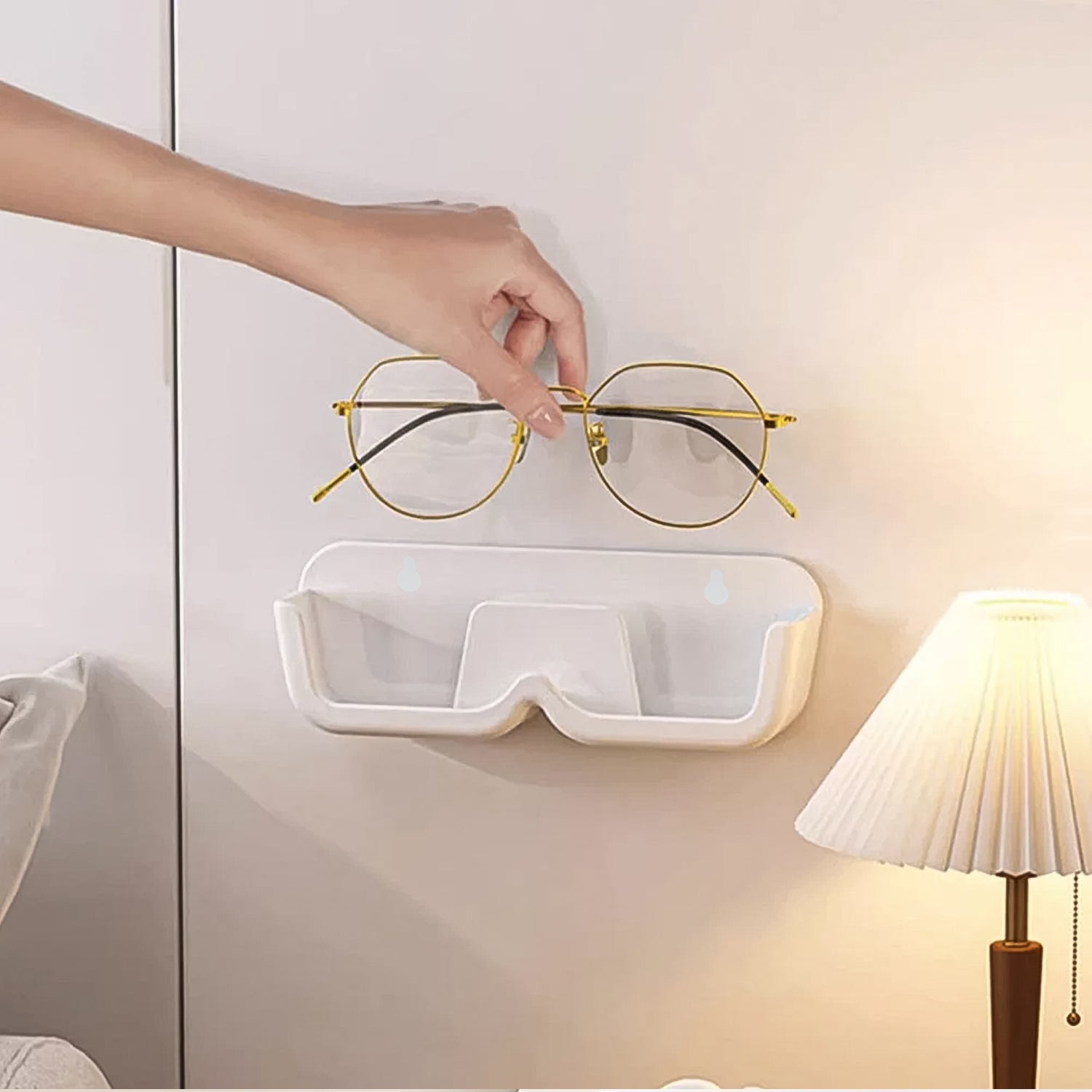 Wukusy wall mount adhesive sunglass holder for organizing sunglasses on a home improvement wall.