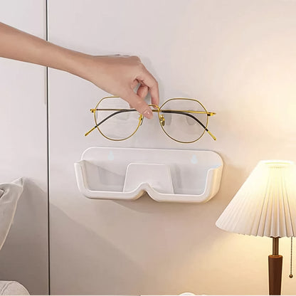 Wukusy wall mount adhesive sunglass holder for organizing sunglasses on a home improvement wall.