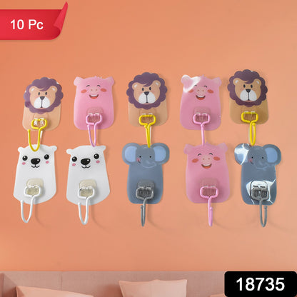 Set of 10 Wukusy wall-mounted cartoon hooks with self-adhesive backing for home organization and decor.