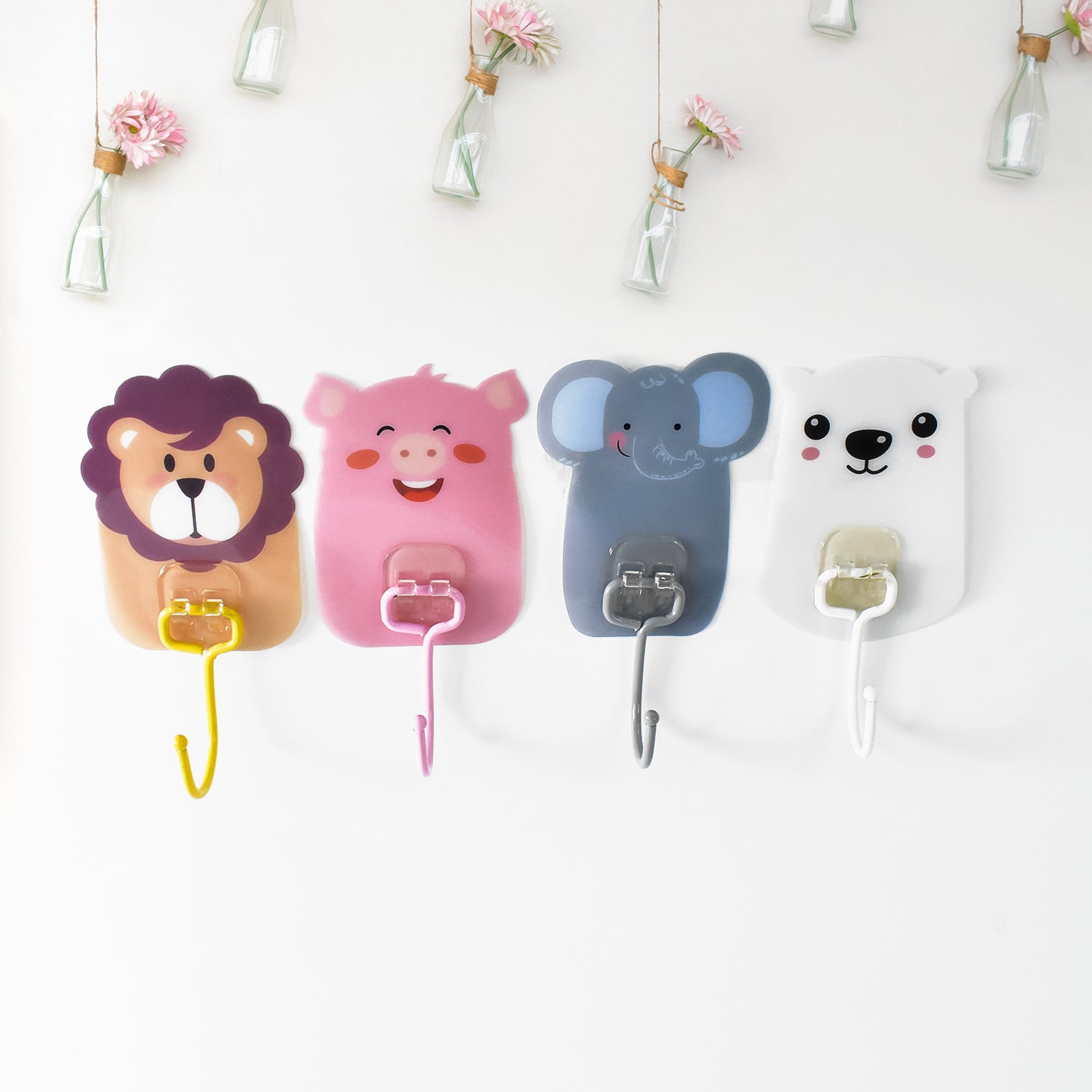 Set of 10 Wukusy wall-mounted cartoon hooks with self-adhesive backing for home organization and decor.