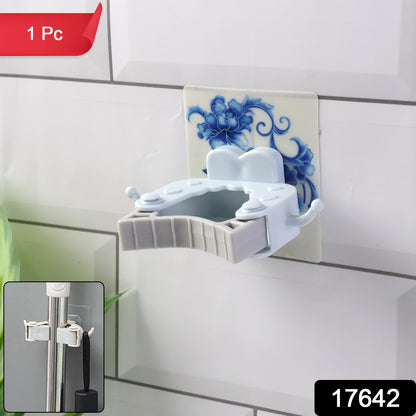 Wall-mounted mop and broom holder clip by Wukusy, designed for organizing cleaning tools in home improvement spaces.