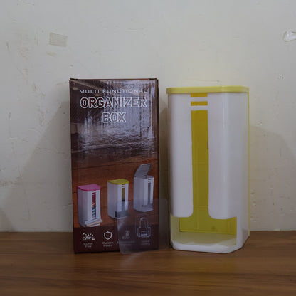 Wall-mounted plastic bag holder by Wukusy, designed for home improvement, showing the plastic bag storage solution mounted on the wall.
