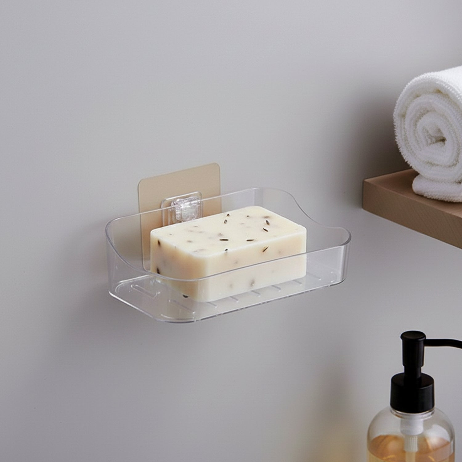 Wall-mounted transparent soap dish holder set by Wukusy, designed for bathroom or kitchen wall mounting, made of clear durable material.