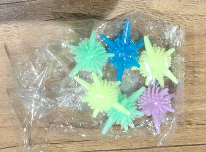 Six reusable soft spiky laundry balls for washing machines by Wukusy, designed to improve laundry efficiency and fabric care.