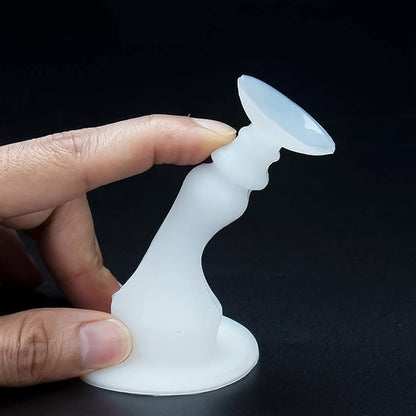 White washing machine door holder and stopper by Wukusy, designed to keep the washing machine door open securely.