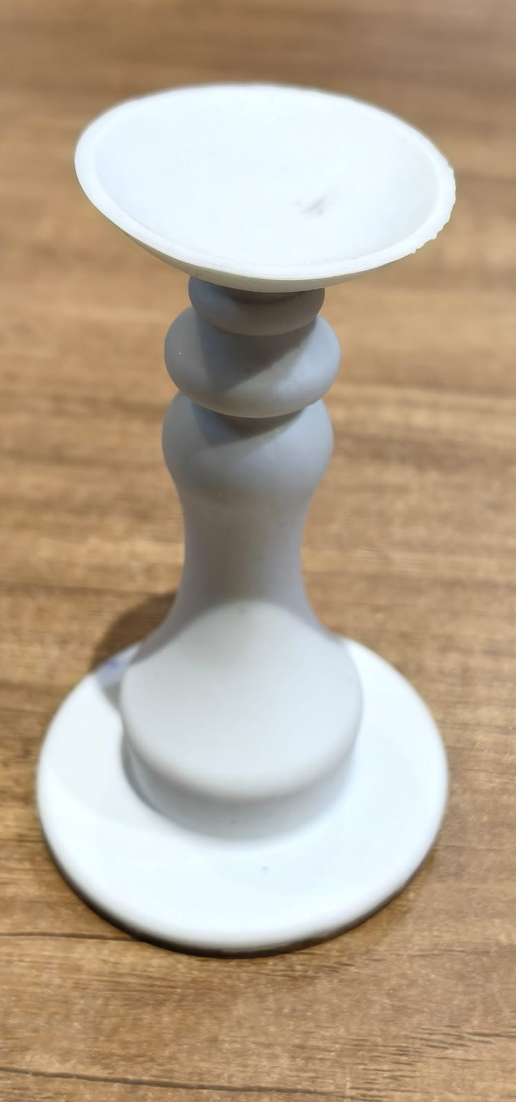 White washing machine door holder and stopper by Wukusy, a durable home improvement accessory for keeping doors open or closed.