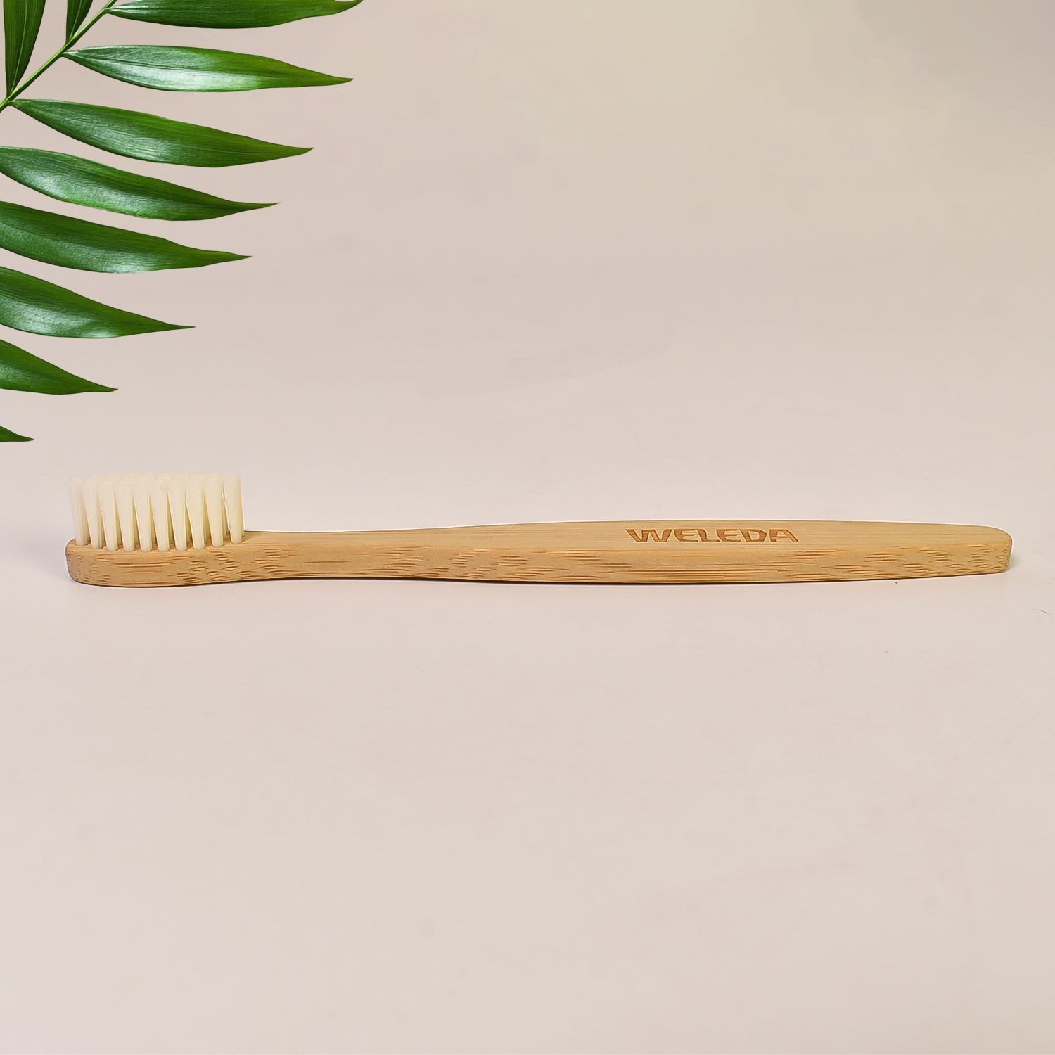 Wukusy wooden bamboo toothbrush with ultra-soft bristles, eco-friendly dental care tool for gentle cleaning.