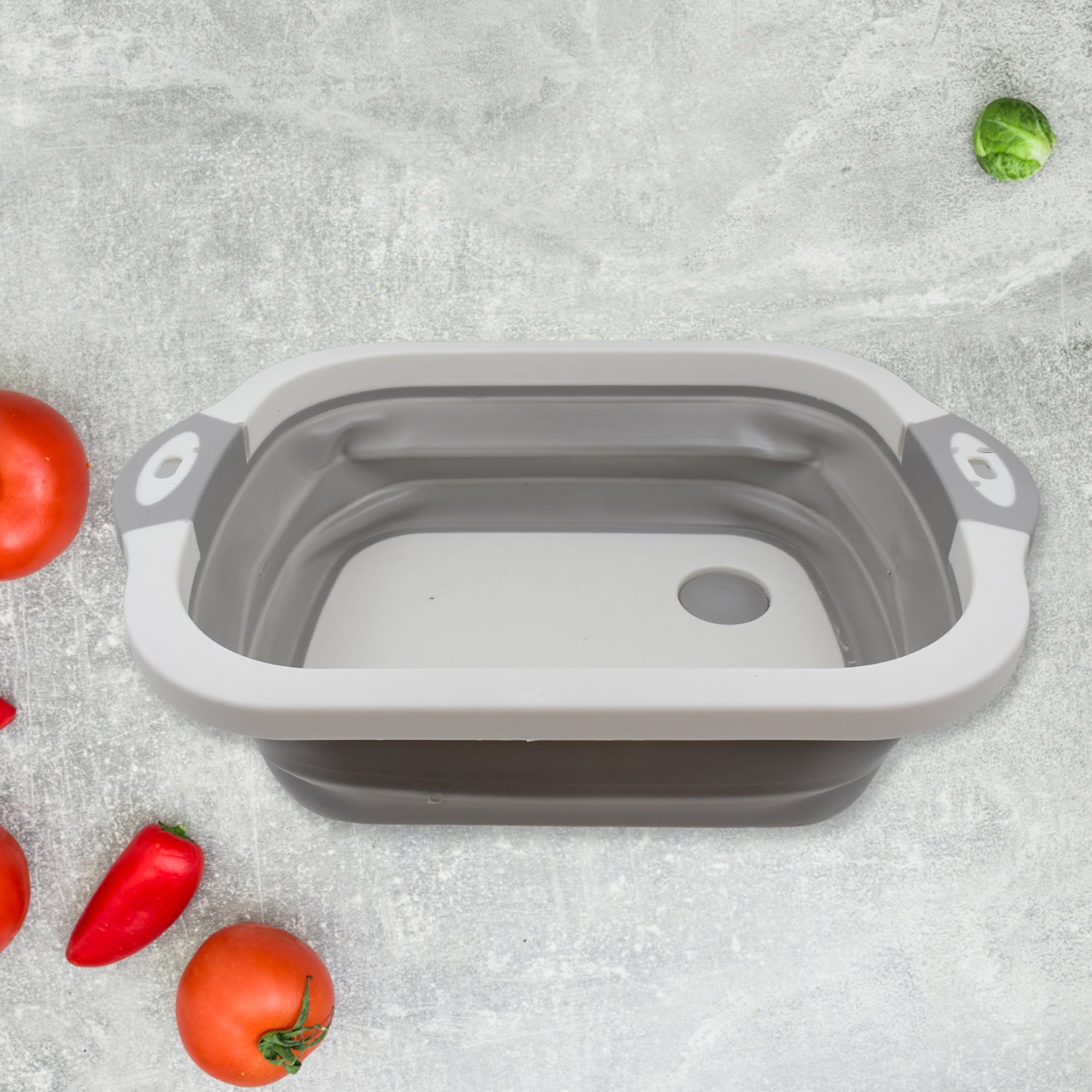 Wukusy collapsible cutting board with integrated dish tub basket, compact and foldable for kitchen food prep and cleaning.