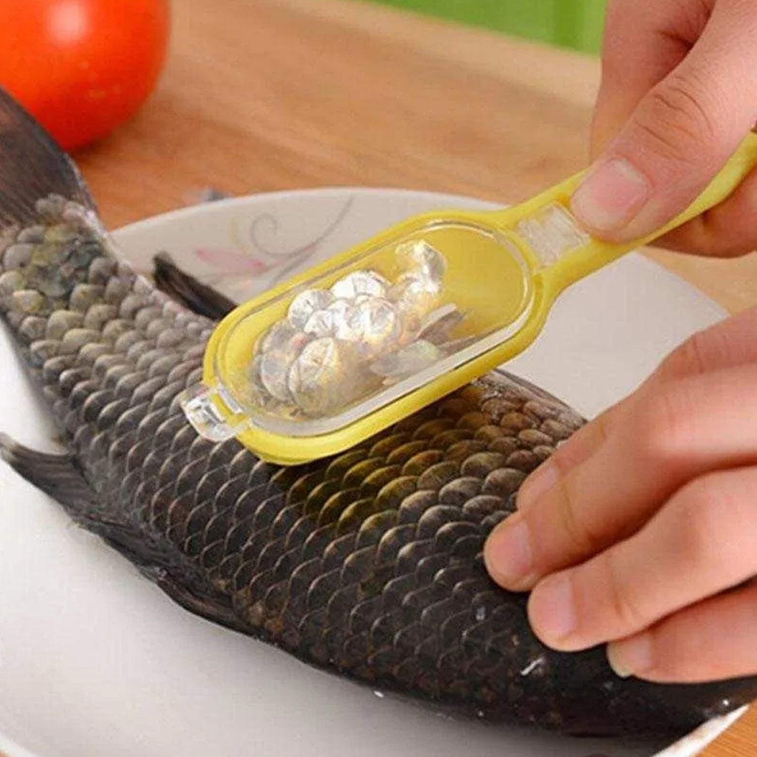 Wukusy plastic fish scales grater and scraper with cover, used for cleaning and removing scales from fish in the kitchen.