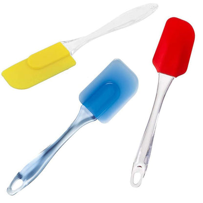 Wukusy spatula and pastry brush set for cake mixing and baking, featuring a black spatula and a silicone pastry brush.
