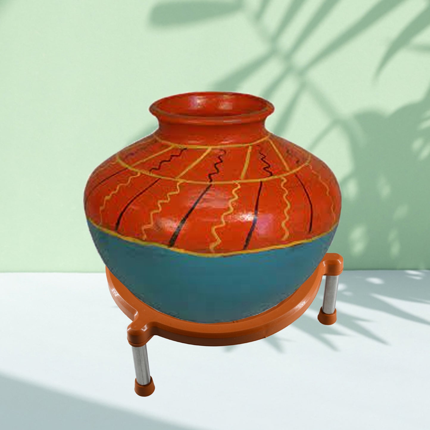 Plastic multipurpose Matka stand by Wukusy, used for supporting plant pots and water pots in home and kitchen settings.