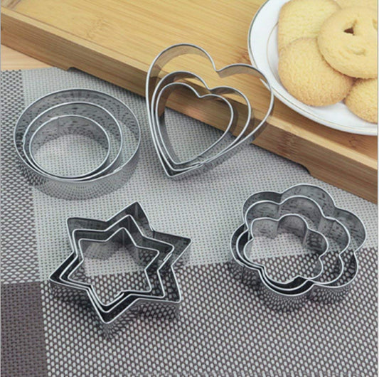 Set of 12 stainless steel Wukusy cookie cutters in heart, round, star, and flower shapes for baking and decorating.