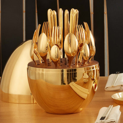 Wukusy 24-piece premium gold cutlery set with stylish oval stand, includes spoons, forks, and knives arranged neatly.