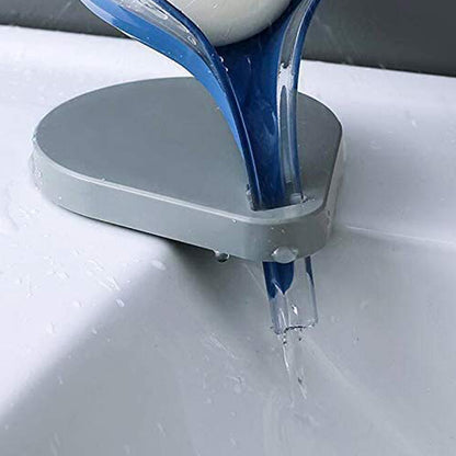 Wukusy leaf-shaped soap tray with suction cup, self-draining plastic soap box for bathroom and kitchen storage.