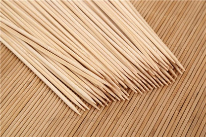 Wukusy 30cm wooden bamboo BBQ skewers for grilling meat, vegetables, and fruit at outdoor barbecues and parties.