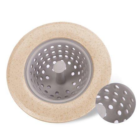 Wukusy 1120 Silicon Sink Strainer in kitchen basin, flexible drain basket for trapping debris in kitchen sink.
