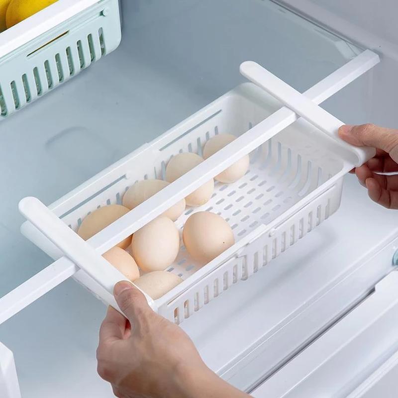 Set of four adjustable Wukusy fridge storage baskets and sliding racks for organized kitchen and refrigerator organization.