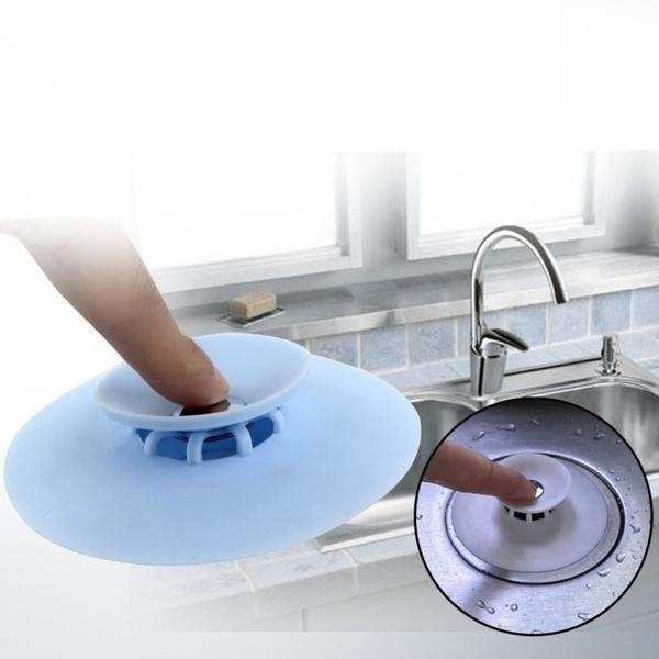 Wukusy 2-in-1 silicone sewer sink sealer cover and drainer in multicolour, designed for kitchen and bathroom sinks.
