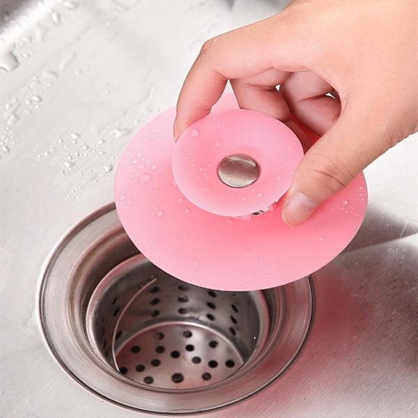 Multicolour silicone sewer sink sealer cover and drainer by Wukusy, designed for kitchen sinks, flexible 2-in-1 home and kitchen use.