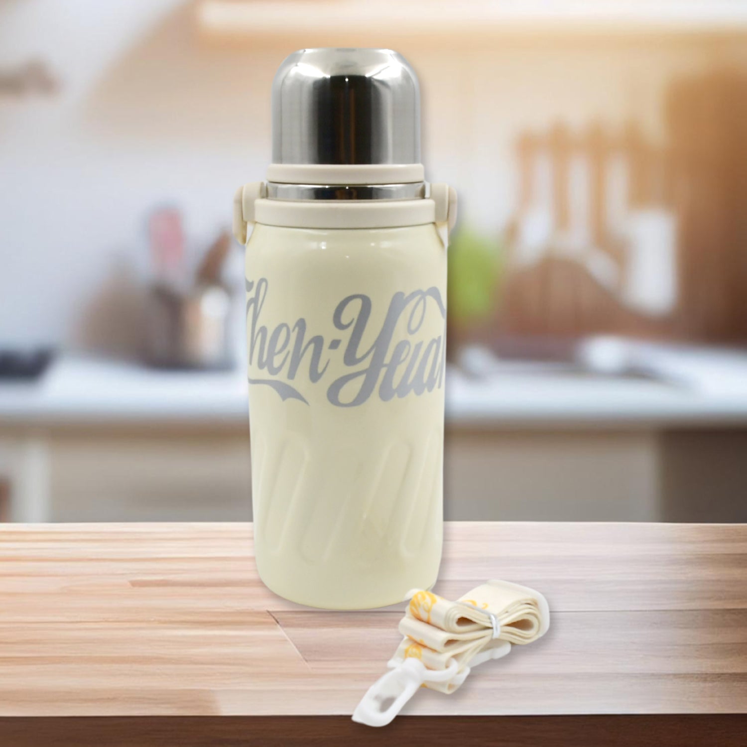 Wukusy stainless steel vacuum insulated water bottle with hanging strap, wide mouth, leak-proof design, ideal for hot and cold drinks, 900ml.