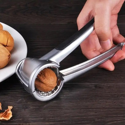 Wukusy walnut cracker and nut cutter made of stainless alloy, featuring a portable clamp design for pecans, almonds, and Brazil nuts.