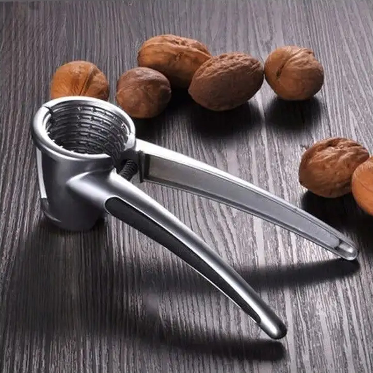 Wukusy walnut cracker and nut cutter made of stainless alloy, portable clamp for cracking walnuts, pecans, almonds, and Brazil nuts.