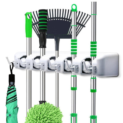 Wall-mounted Wukusy 5-layer multipurpose organizer for mops and brooms in a home and kitchen setting