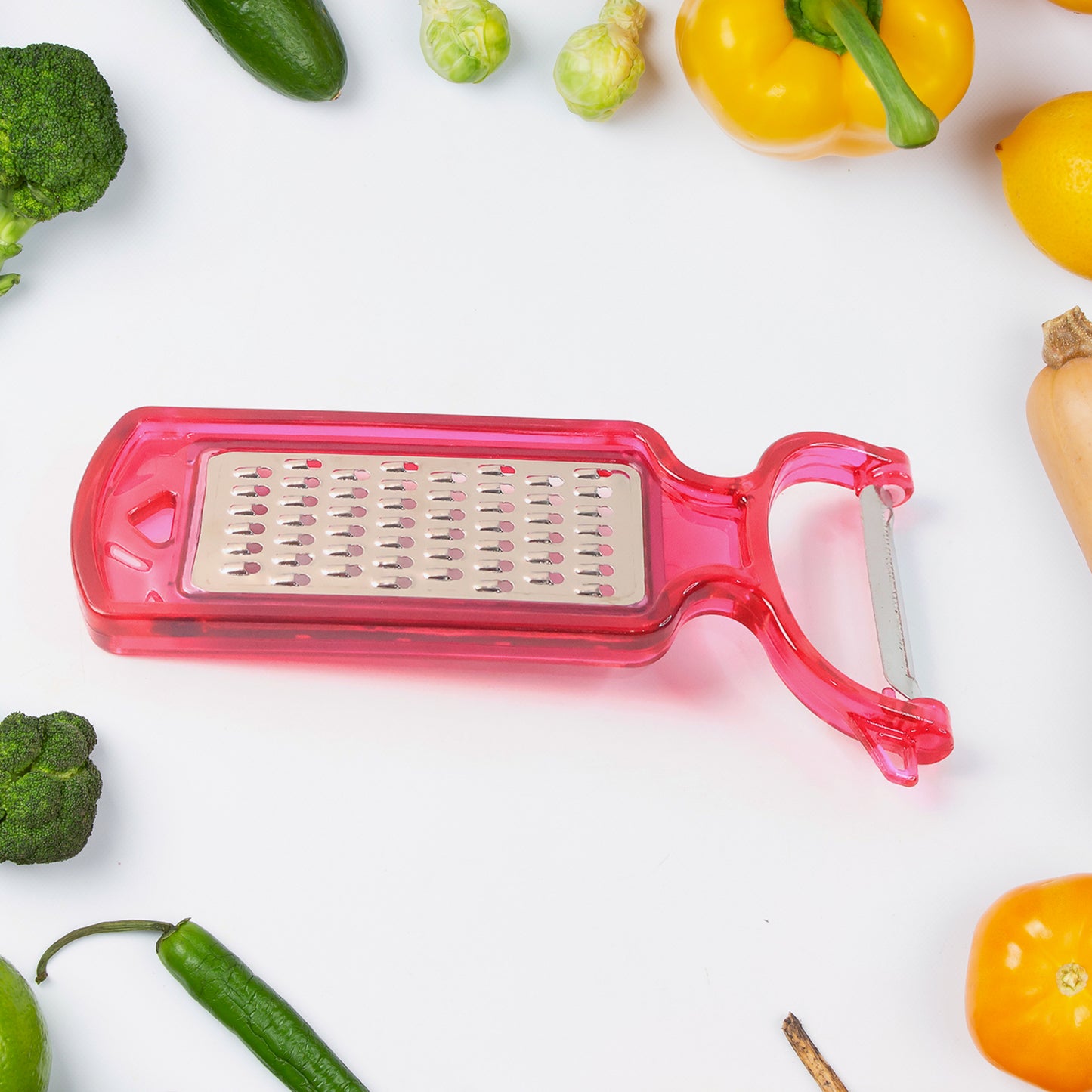 Wukusy 2-in-1 multifunctional kitchen peeler with grater, stainless steel blades, ideal for peeling and grating vegetables and fruits.