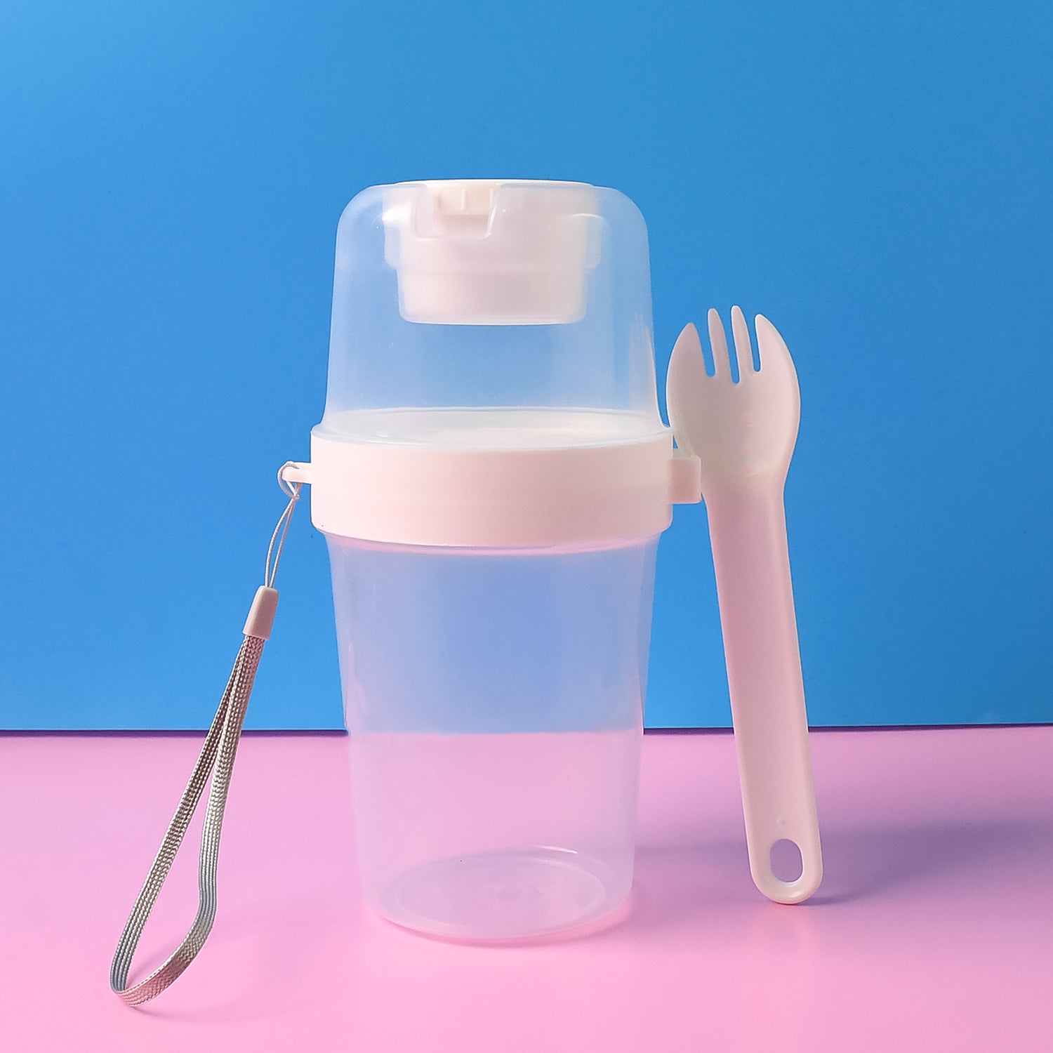 Wukusy 2-piece salad cup lunch container with dressing storage and reusable fork, ideal for home and kitchen meal prep.