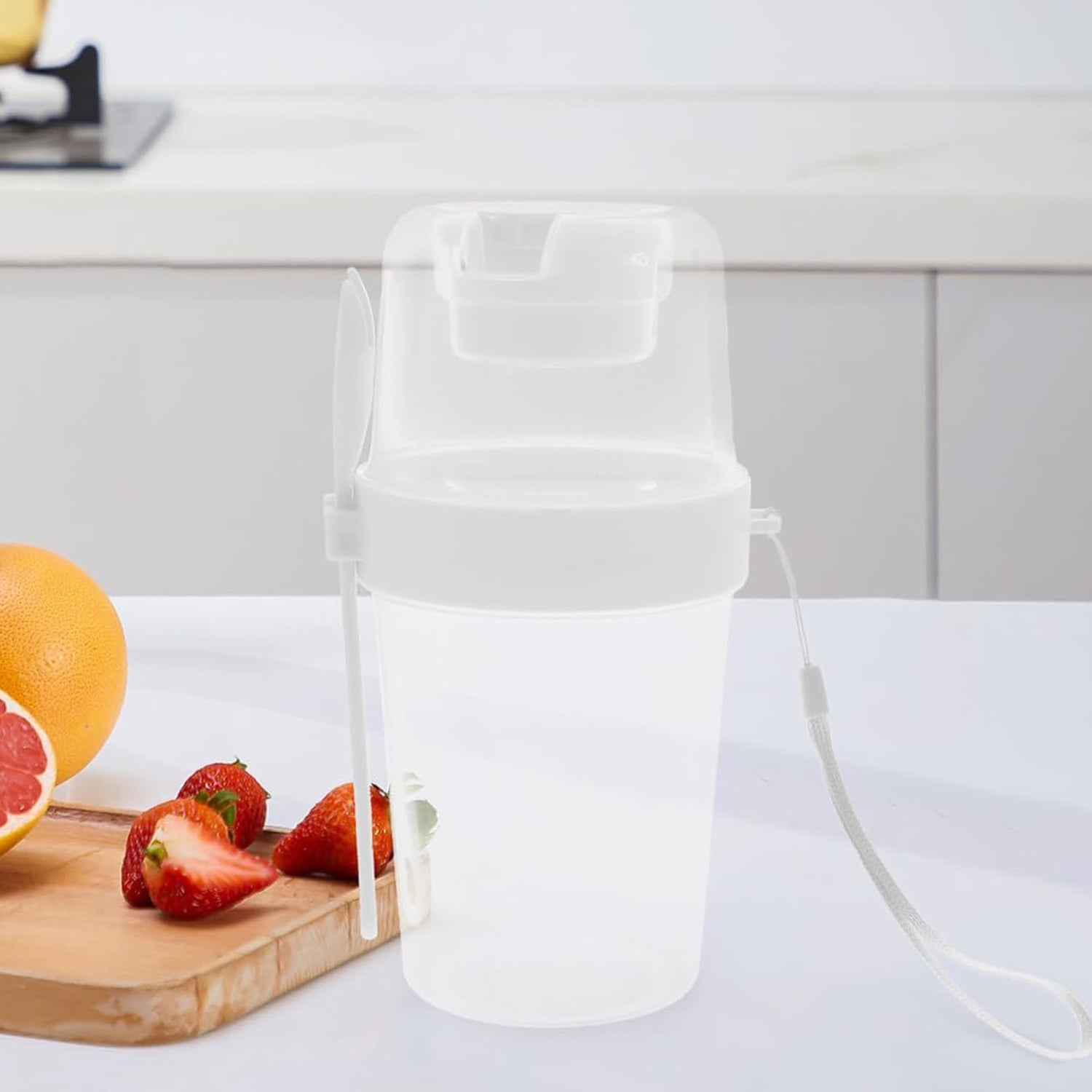 Wukusy 2-piece salad cup lunch container with dressing storage and reusable fork for home and kitchen use.