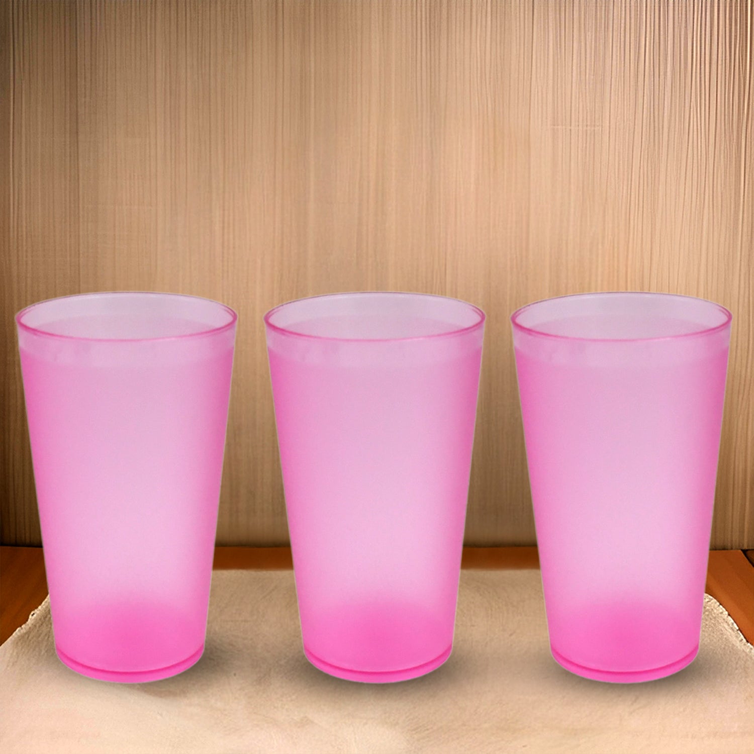 Six large Wukusy plastic glasses, 300ml each, used for drinking water and beverages in home, kitchen, and office settings.
