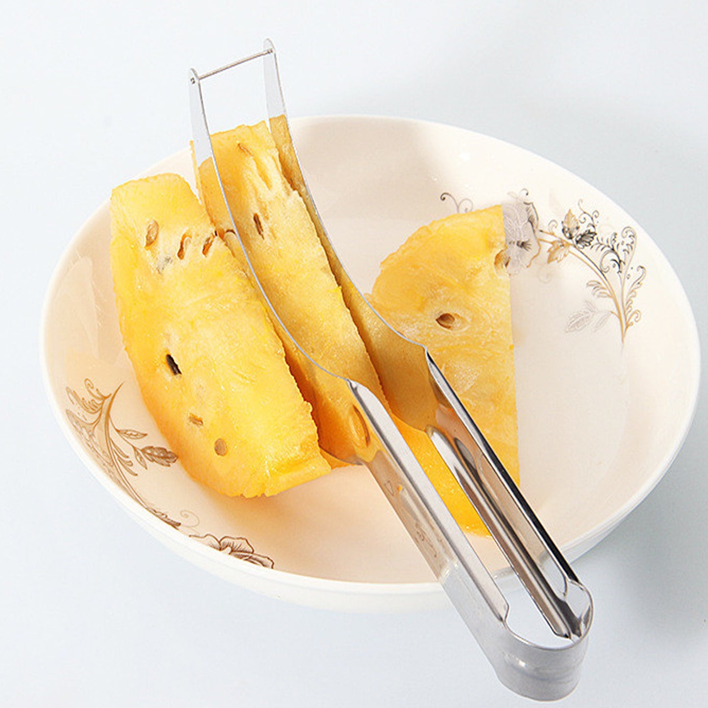 Wukusy stainless steel watermelon and cantaloupe slicer knife with corer for easy fruit cutting and preparation in the kitchen.