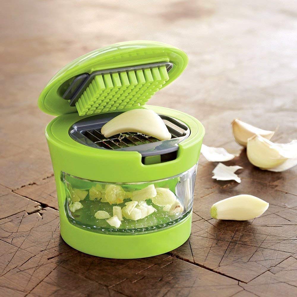 Wukusy ginger garlic crusher for kitchen, handheld stainless steel tool for easy grinding of fresh ginger and garlic.