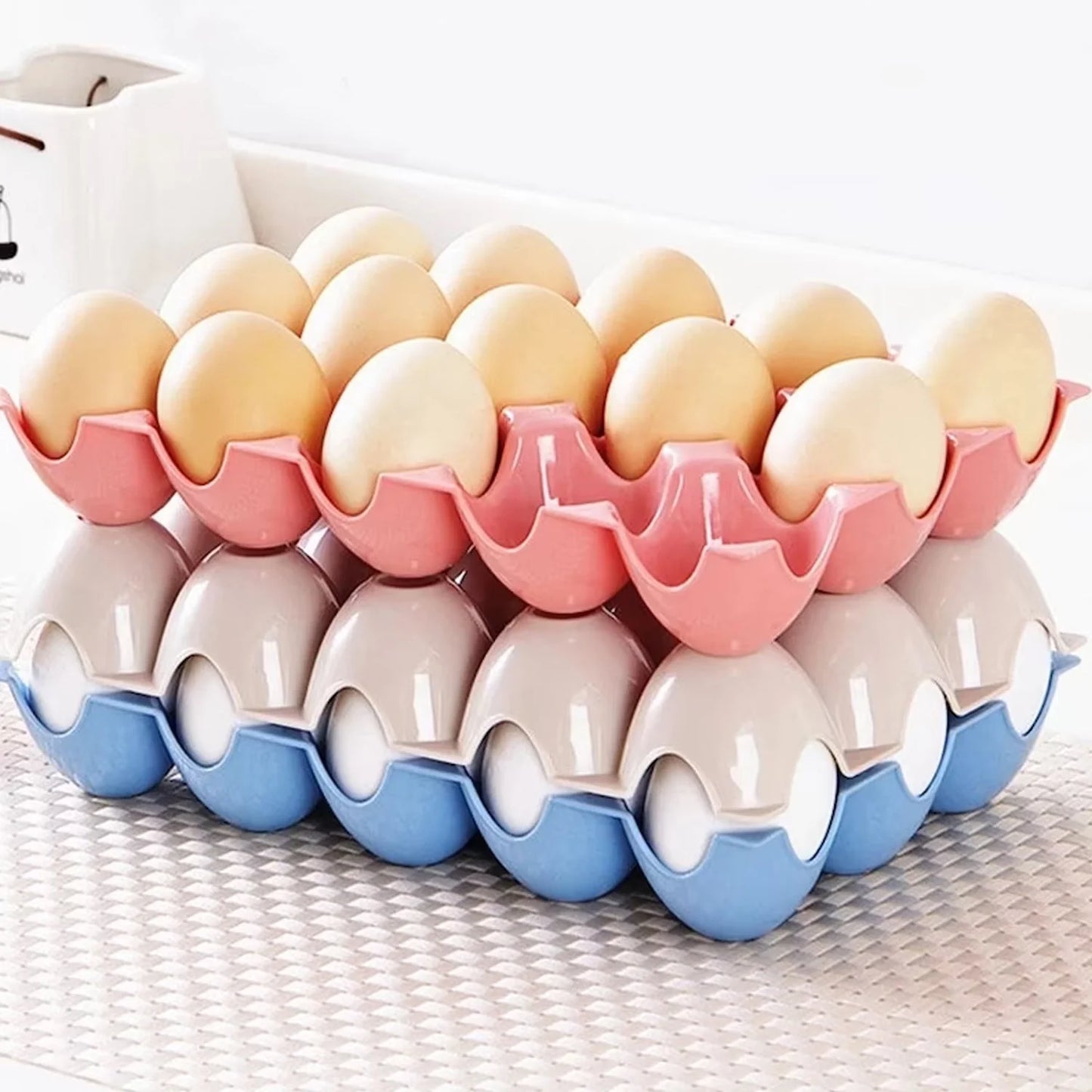 Set of four Wukusy 15-cavity plastic egg trays for kitchen storage, each holding 15 eggs securely.