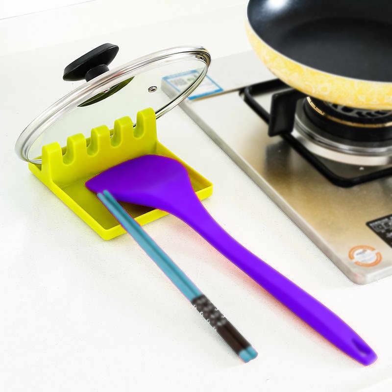 Wukusy 2121 multi-functional spatula holder rest for kitchen utensils, made of durable material, designed to keep utensils organized.