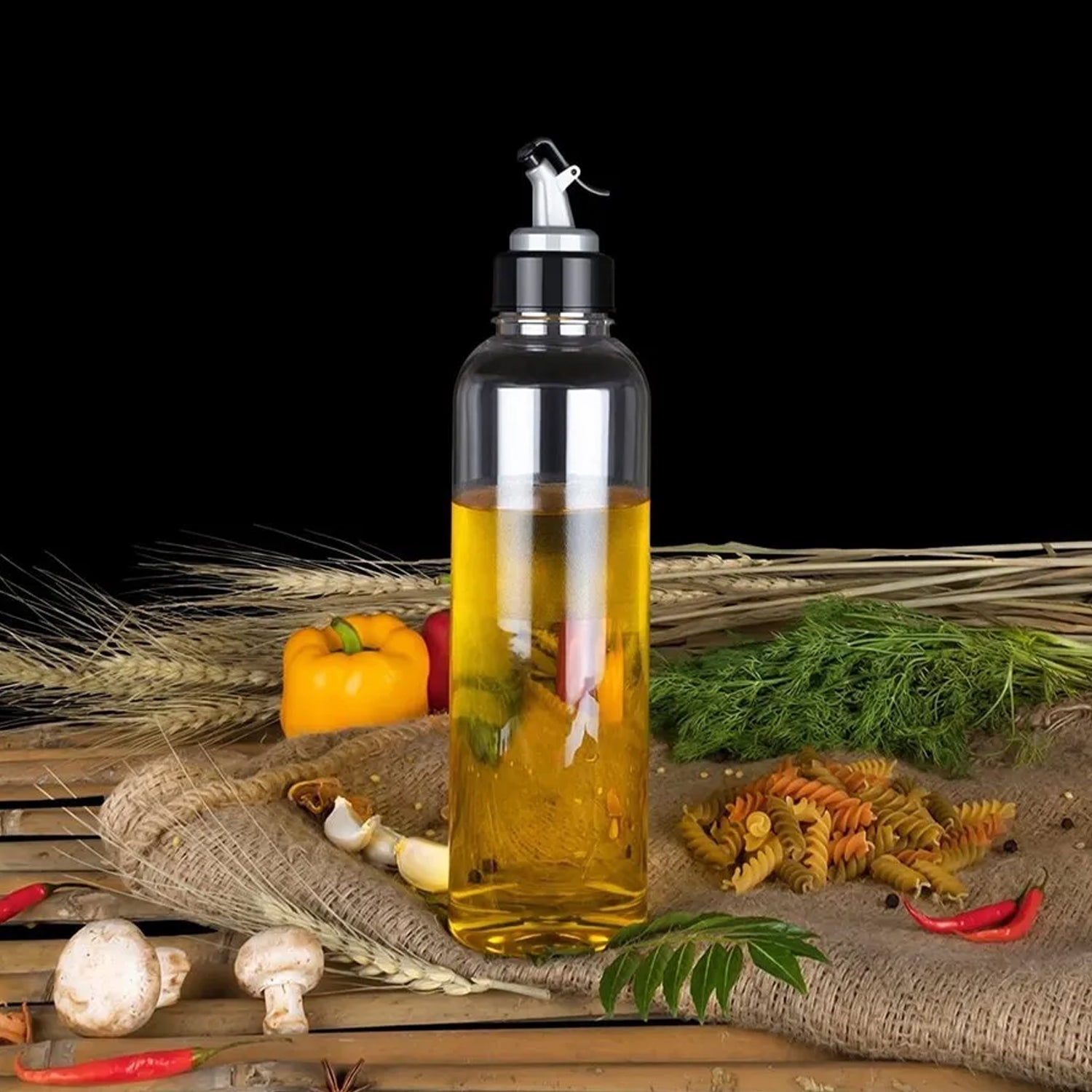 Wukusy 1-liter clear oil dispenser with lid and drip-free spout, ideal for controlled use in home and kitchen cooking.
