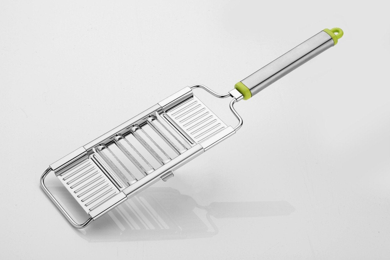 Wukusy 6-in-1 stainless steel kitchen chopper, cutter, slicer, and grater with handle for versatile food prep.