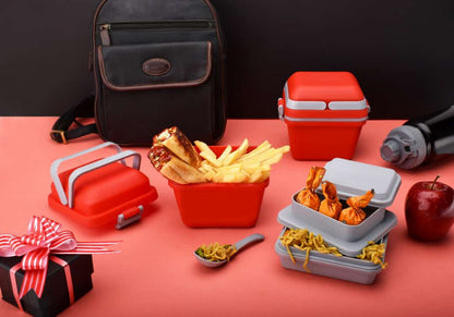 Wukusy airtight lunch box with handle and push lock for secure food storage, made of durable plastic and featuring a convenient carrying handle.